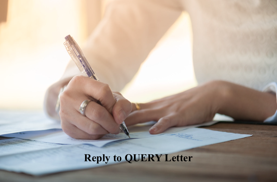 Women writing Reply to Query Letter